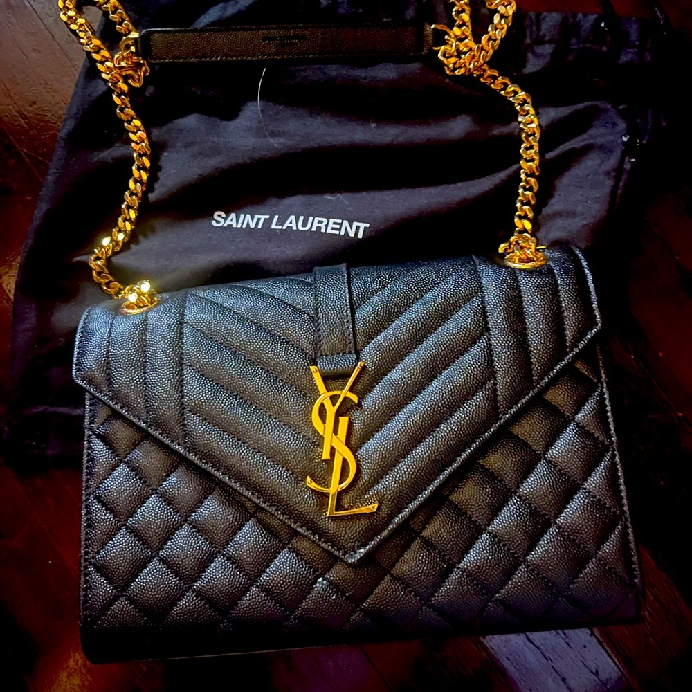 BRAND NEW SAINT LAURENT - $1750.00
